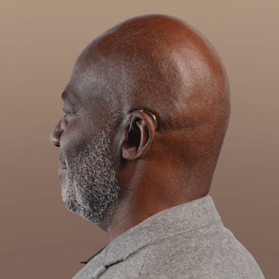 Oticon Intent hearing aid worn