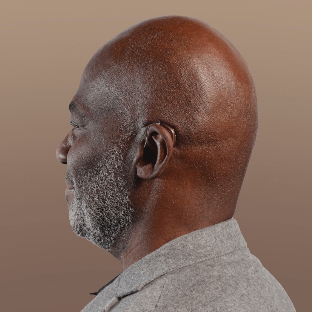 Oticon Intent hearing aid worn